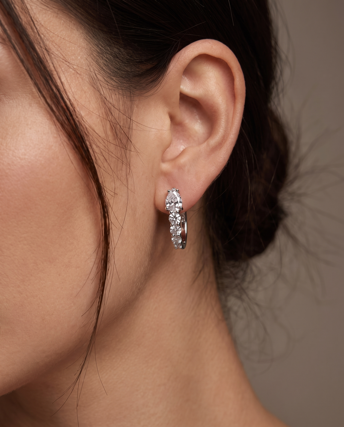 Solara Earrings with pear and round-cut zirconia stones